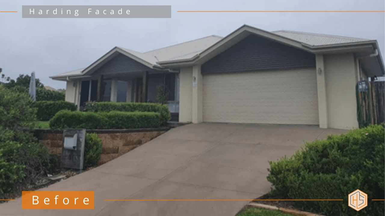 A dated house from the early 2000s with beige paint and a lackluster appearance.