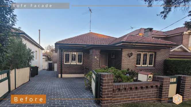 Before renovation image of a characterless brown brick house, awaiting transformation into a traditional style, featuring plans for a carport addition and a new front entry